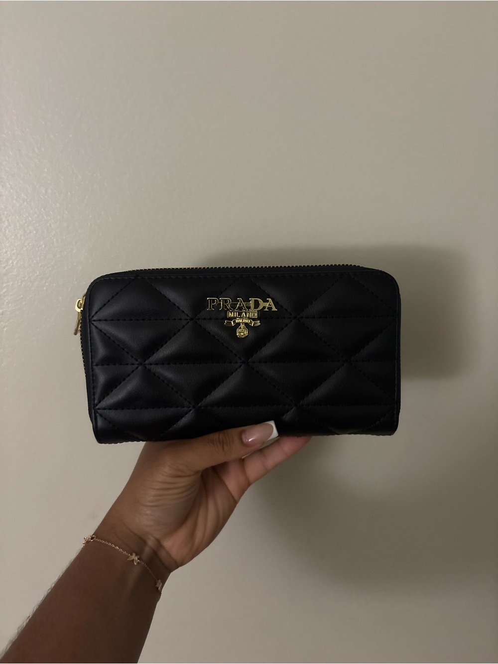Prada Black Quilted Zip Wallet with Gold Logo